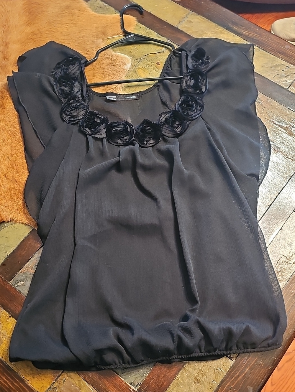 Maurices Black Sleeveless Blouse with Floral Rosette Neckline